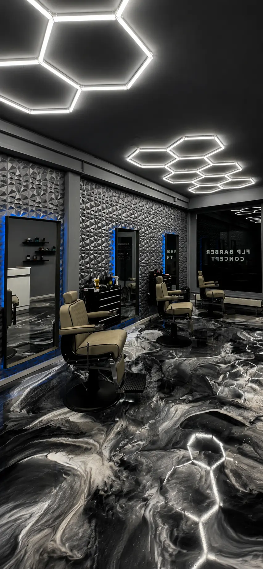 Salon FLP Barber Concept à Morat — fauteuils et éclairage hexagonal